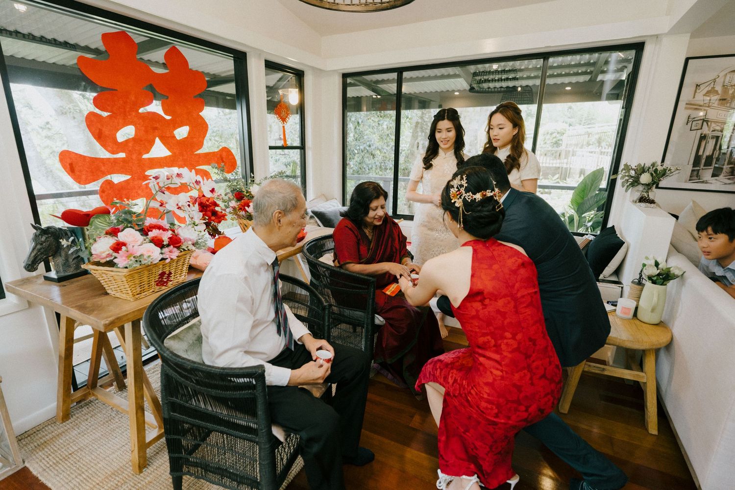 "Candid moment during wedding tea ceremony, captured by Brisbane photographer"