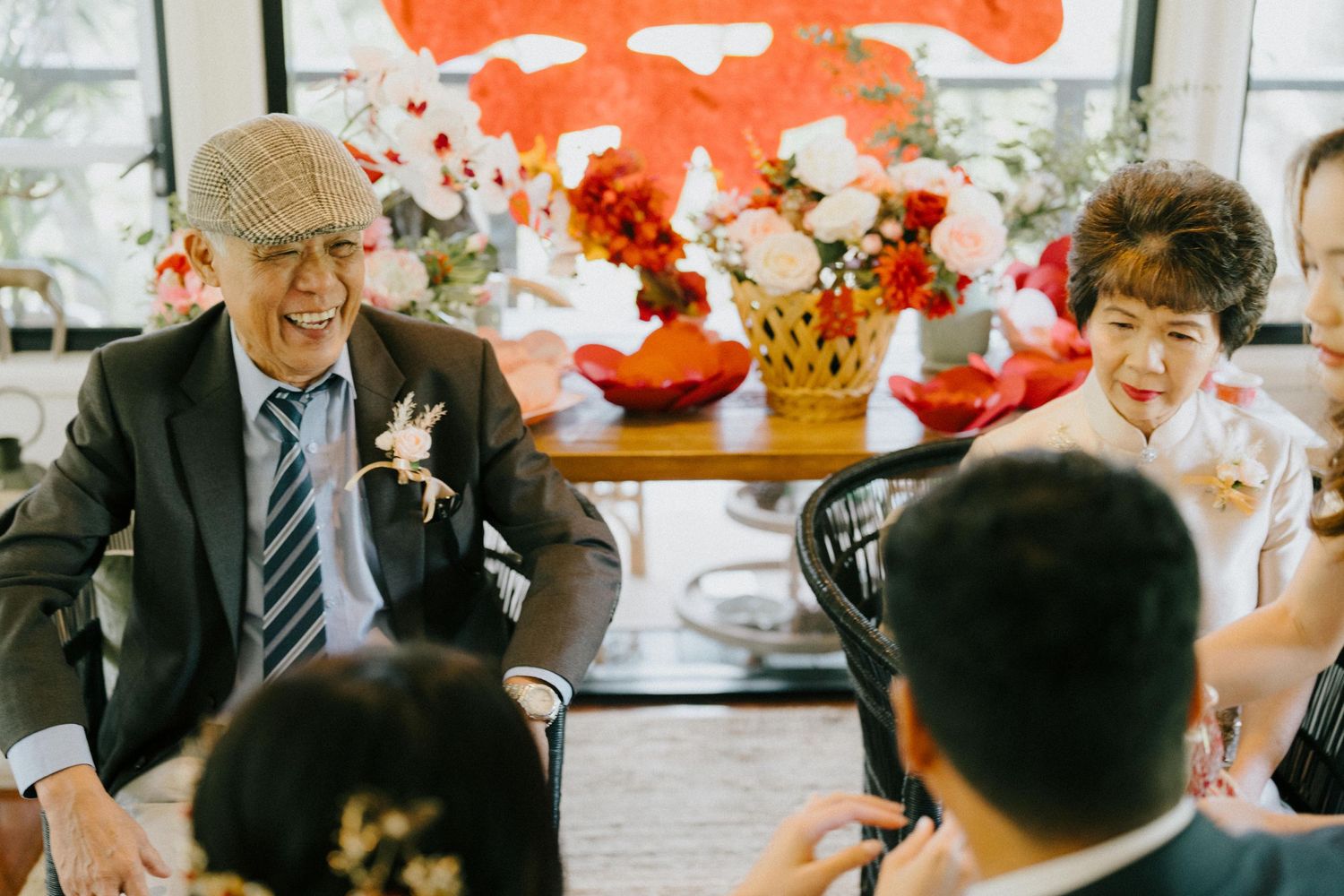 Candid moment during wedding tea ceremony, captured by Brisbane photographer"