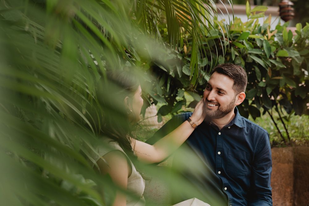 The bride tenderly caressing her fiancé, highlighting their affection during their Mazatlán session