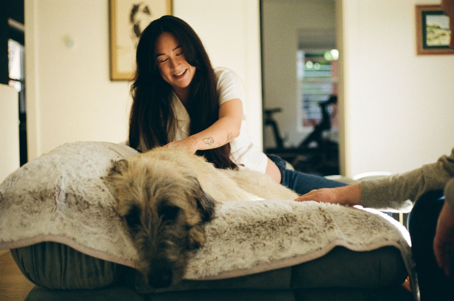 in-home maternity session with natural light, intimate connection and cinematic film tones
