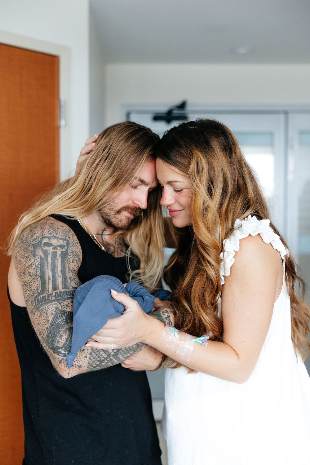 A series of intimate romantic moments showing a couple embracing and touching foreheads in a bright indoor setting.
