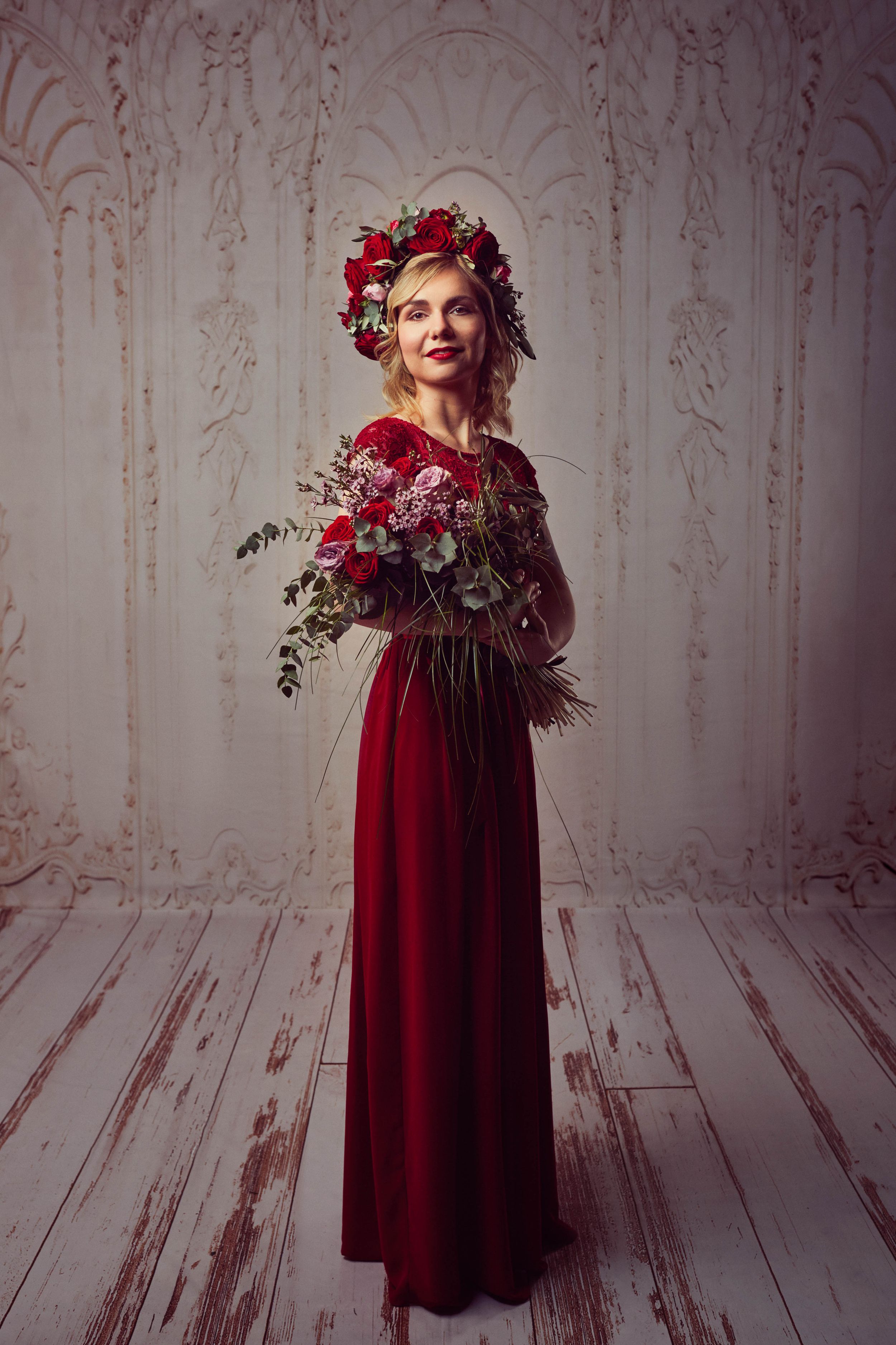 Full body portrait of a woman wearing crimson dress with roses - what a lovely betrayal