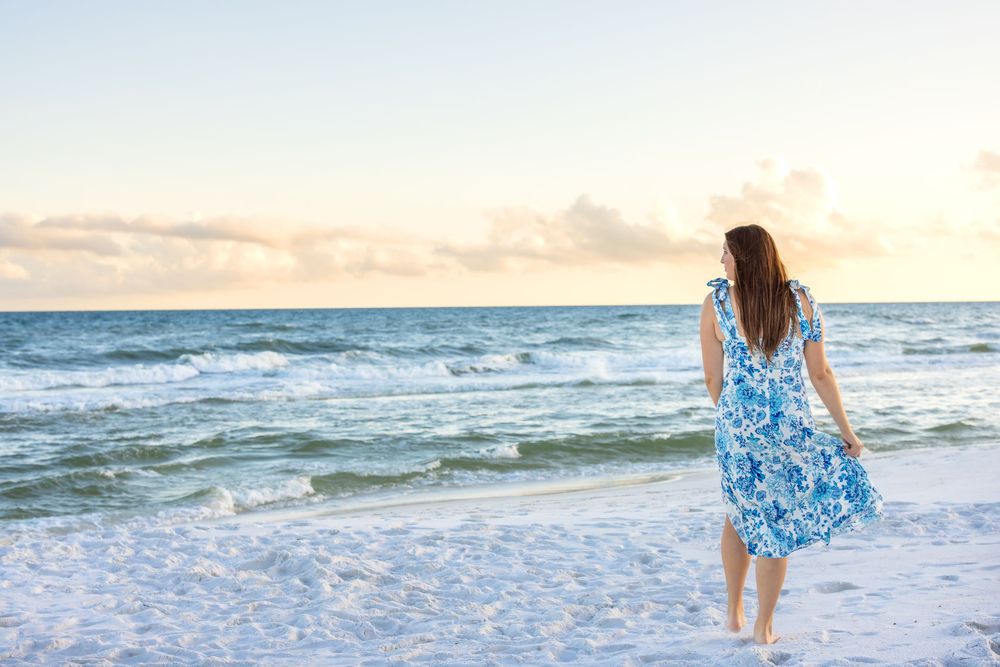 A series of beach photographs with people strolling along the shoreline at sunset with ocean waves and sandy coast.