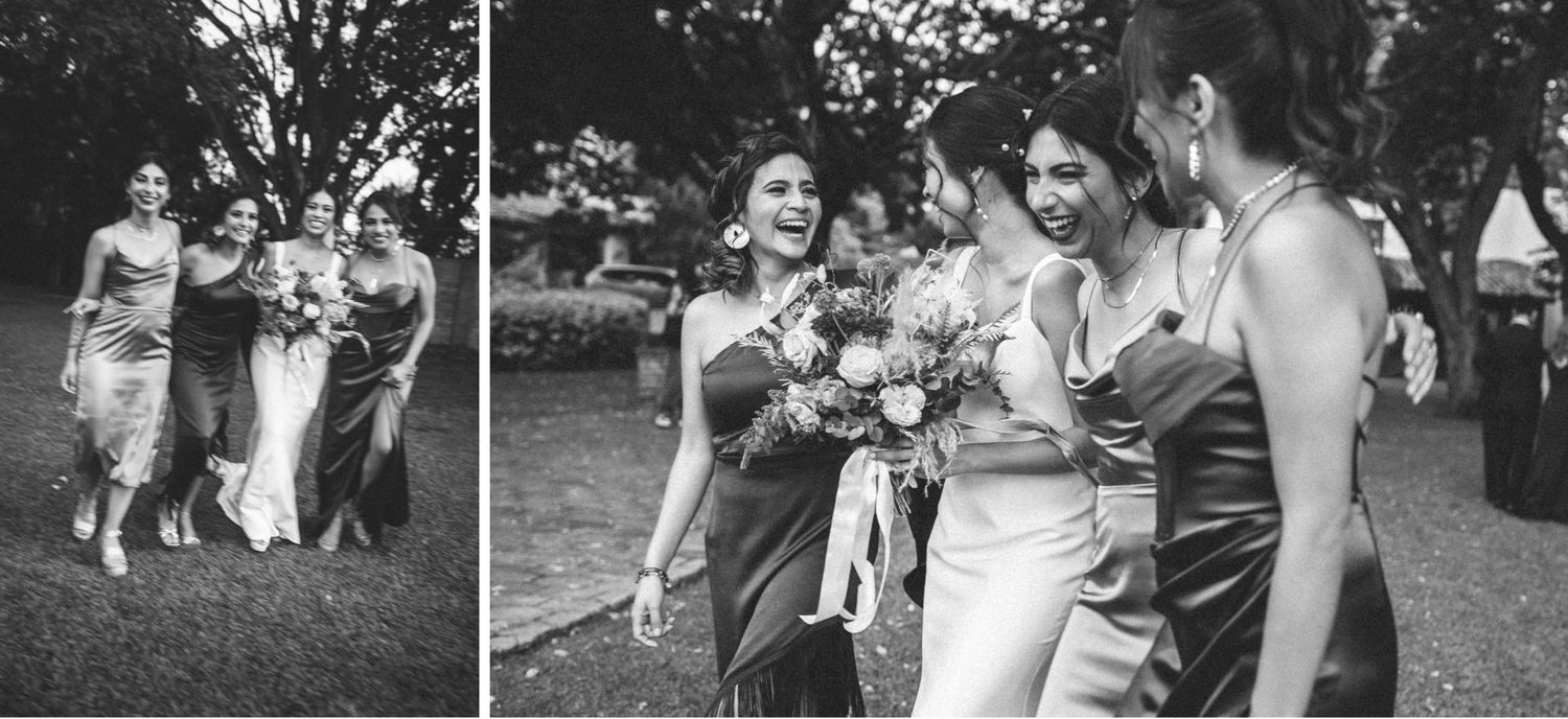 Wedding party members share joyful moments and laughter while walking outdoors in black and white photographs.
