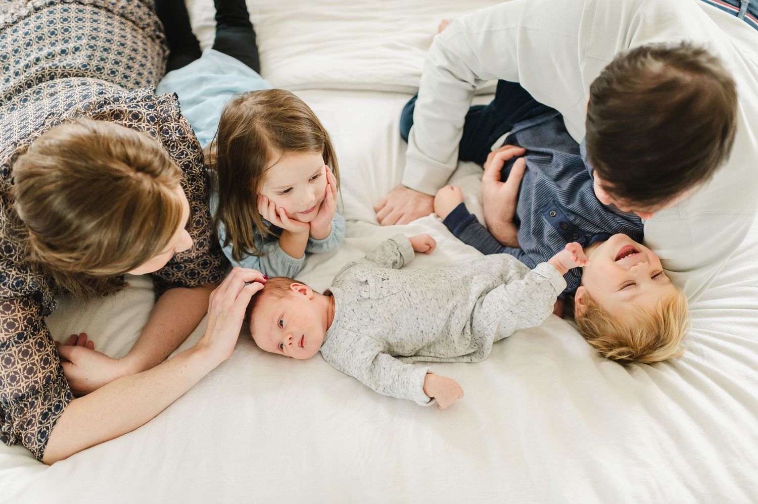 Posed Newborn Photographer based in Denver Colorado offering in Studio Newborn Photo sessions. Centennial Colorado photography studio