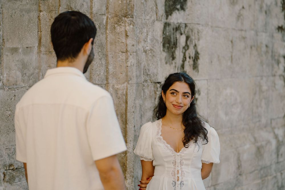 Girlfriend looking at her boyfriend during a Palermo photoshoot in Sicily
