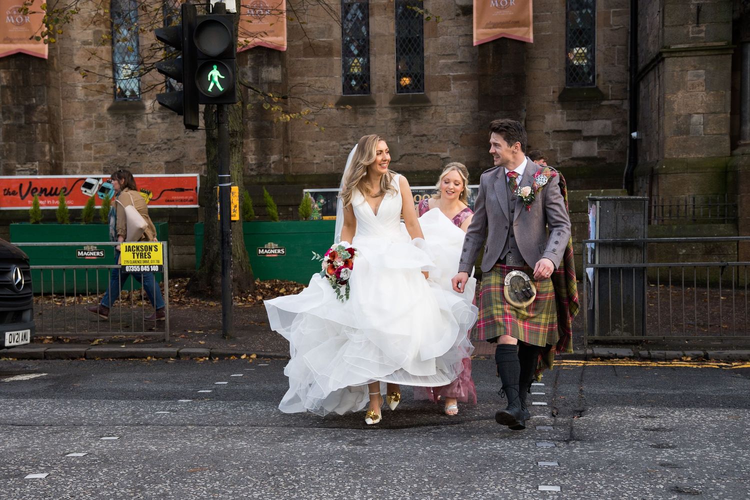 bride and groom crossing road