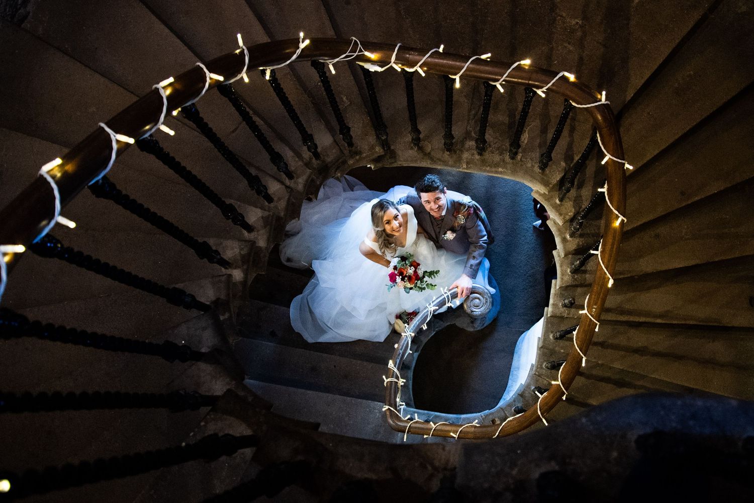 staircase with bride and groom