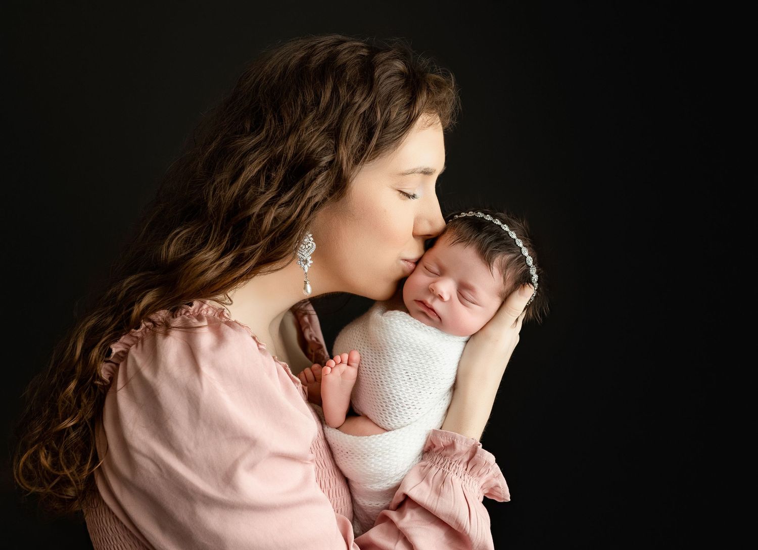 Mom is holding her newborn girl. Greenville, SC newborn photographer, Easley, SC newborn photographer, Upstate, SC newborn photographer.