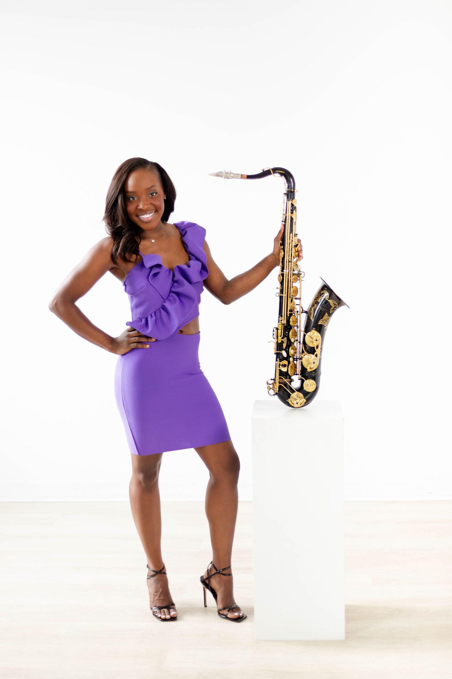 Dynamic photo series with a purple dress and saxophone against white background showing different poses.