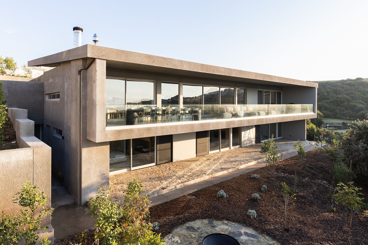 Modern coastal home at Oubaai Golf Estate with panoramic ocean views and soft natural light