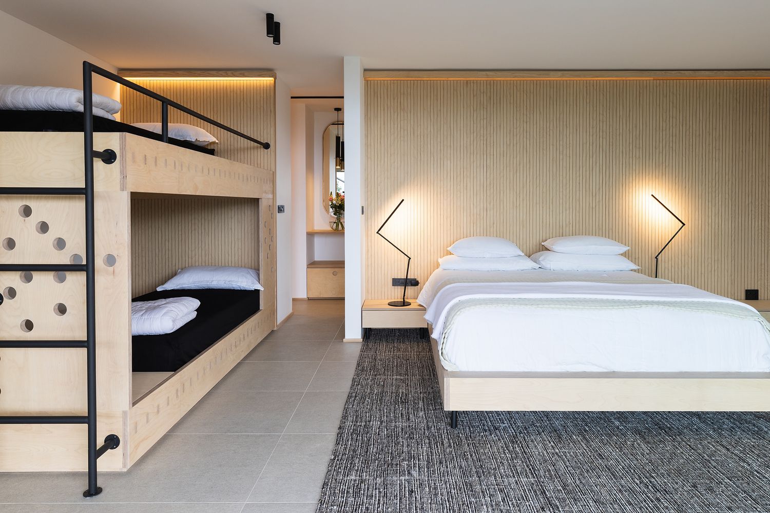 Light-filled bedroom with ocean views and understated modern decor