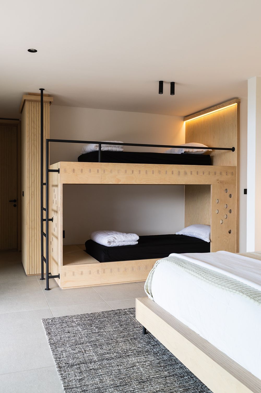 Contemporary bedroom styled with simplicity and soft coastal elements