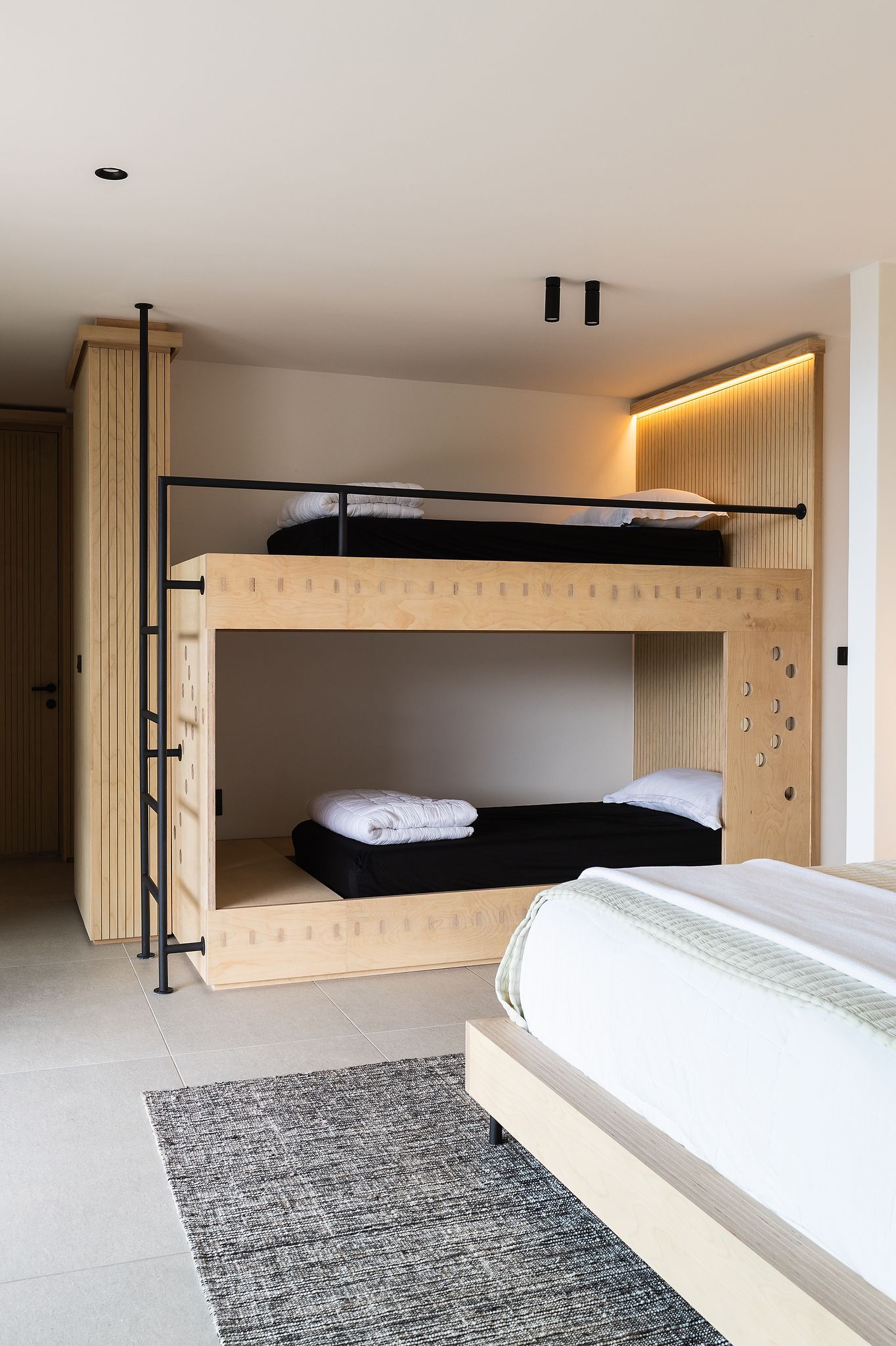 Contemporary bedroom styled with simplicity and soft coastal elements