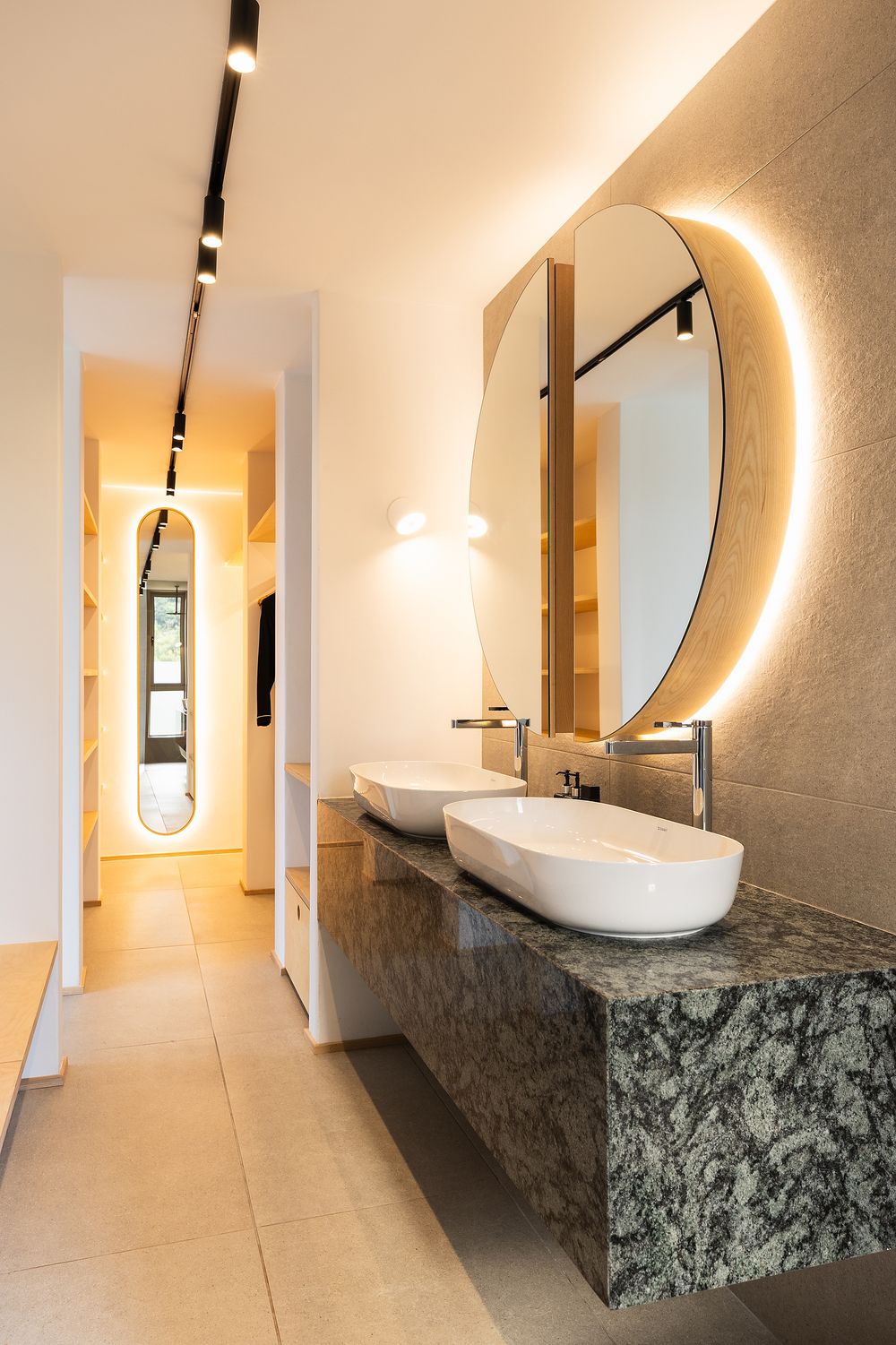 Close-up of natural textures including linen, wood, and stone in a modern home