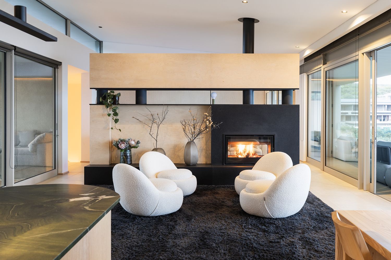 Stylish lounge space combining comfort and modern coastal design