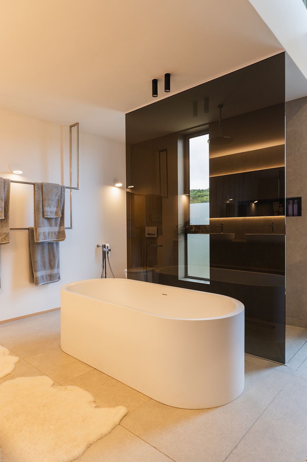 Minimalist bathroom with neutral tones and spa-like atmosphere