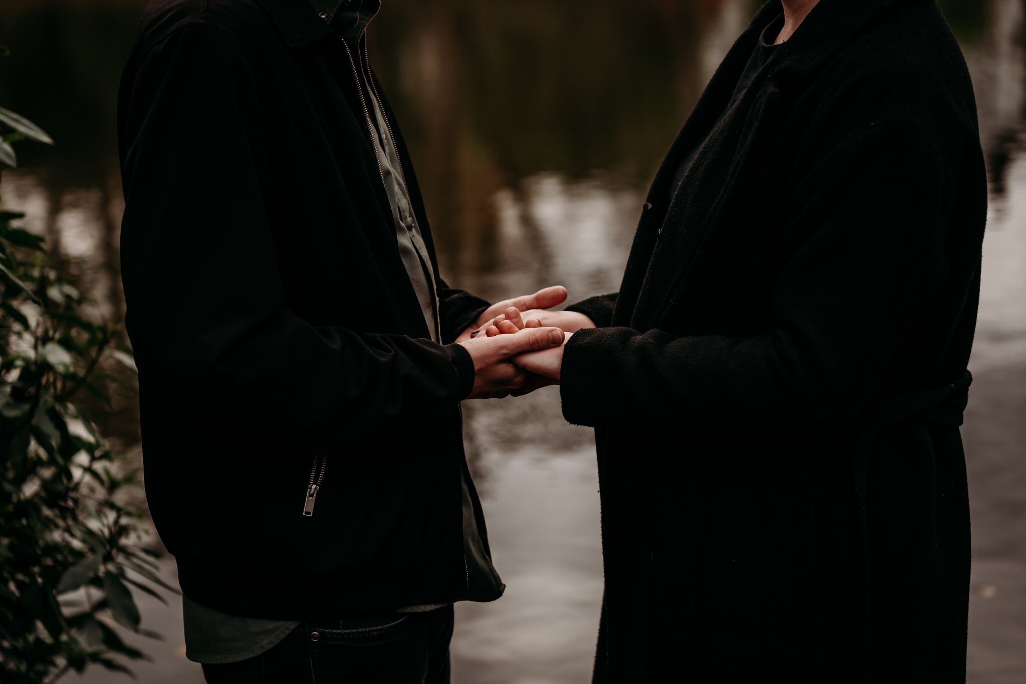 A collection of romantic wedding photography moments showing couples embracing and holding hands in moody lighting.