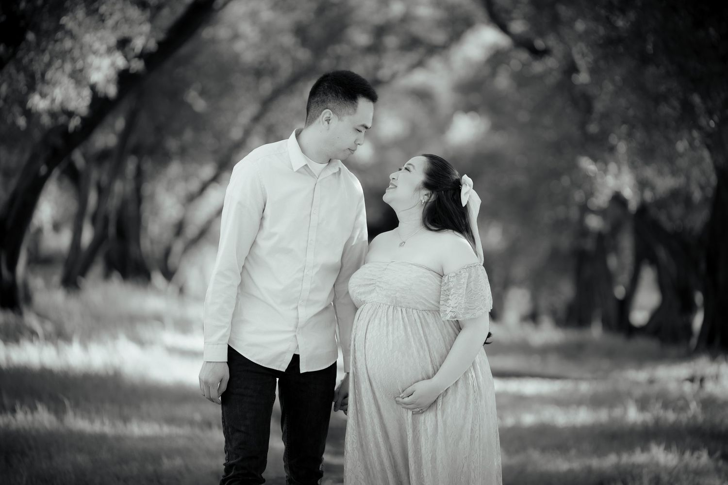 Maternity portrait taken at Jensen Botanical Garden in Carmichael. Photo taken by Sacramento Photographer, Ashley Nicole Baeza.