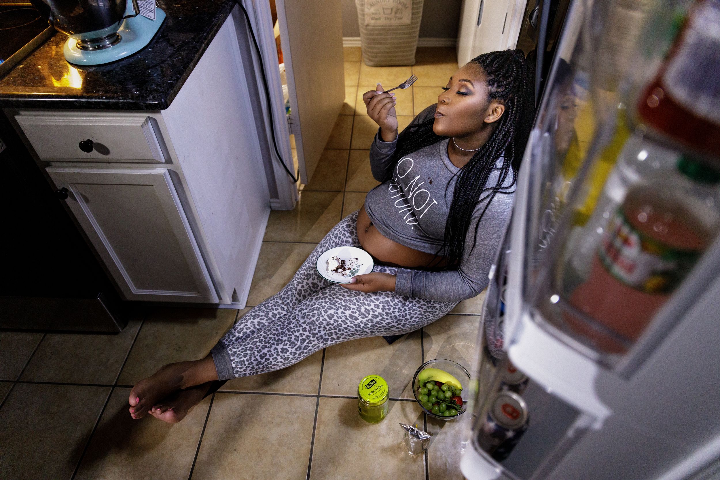 A series of photos showing someone reaching into a refrigerator and getting items at night with dim lighting.