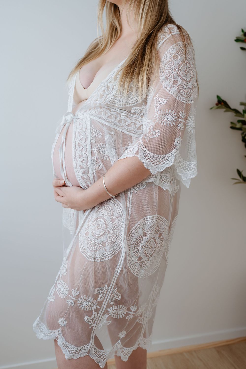 Delicate white lace kimono robe with sheer floral pattern and scalloped edges shown from multiple angles.