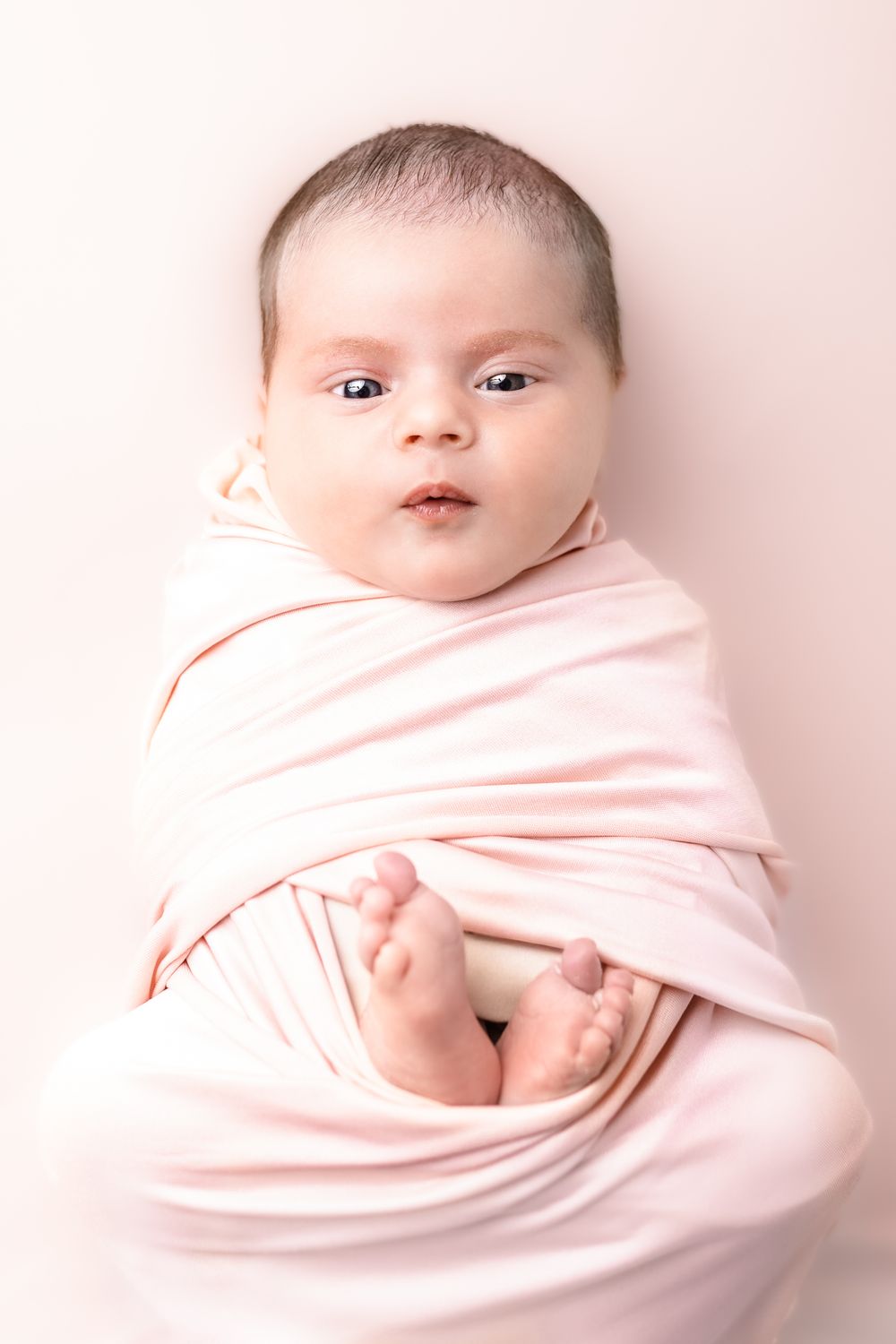 newborn photography at home session new baby studio session swaddle