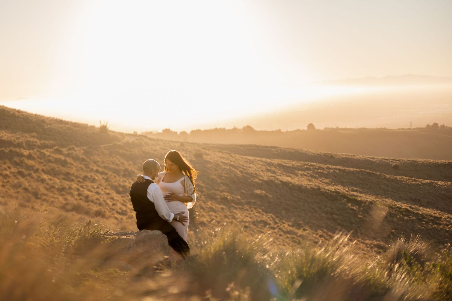 Couples maternity session at Port Hills in Christchurch at sunset