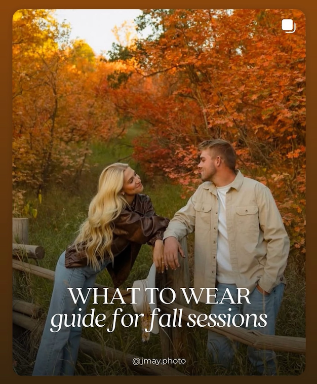 Sioux City, Iowa photographer. Couple wearing earthy fall tones poses near a wooden fence surrounded by vibrant orange autumn foliage.