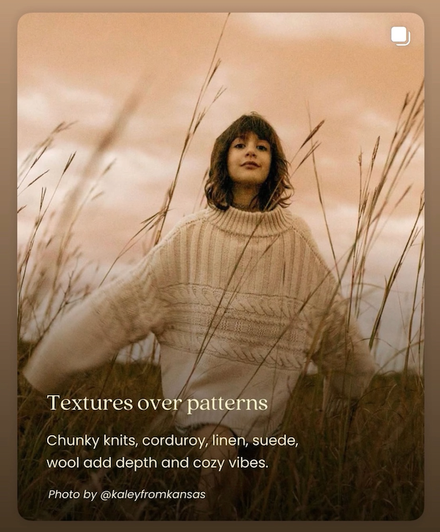 Sioux City, Iowa photographer. Woman in chunky knit sweater stands in tall grass field showcasing textures over patterns for fall photos.