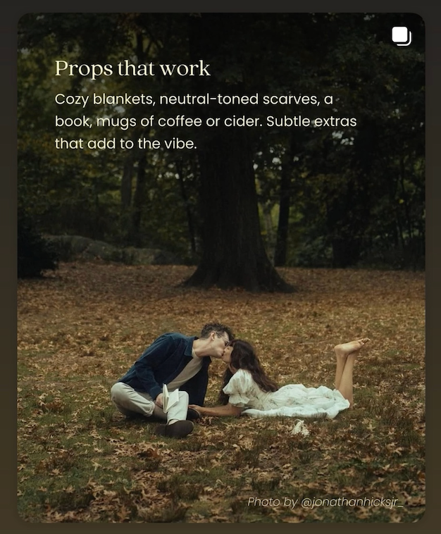 Sioux City, Iowa photographer. Couple sharing a romantic moment on fallen leaves with cozy props like blankets adding to the fall vibe.