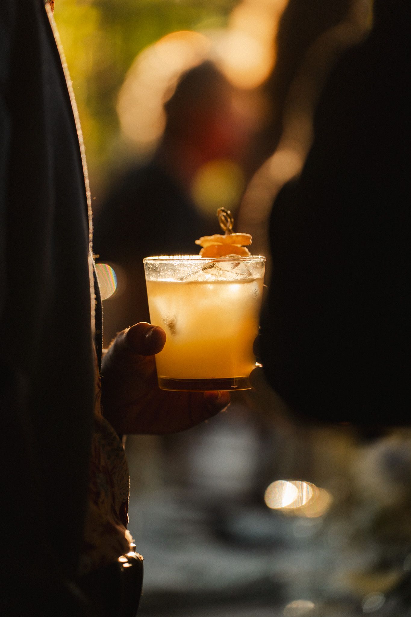 Guests raising glasses during cocktail hour at a Los Angeles wedding