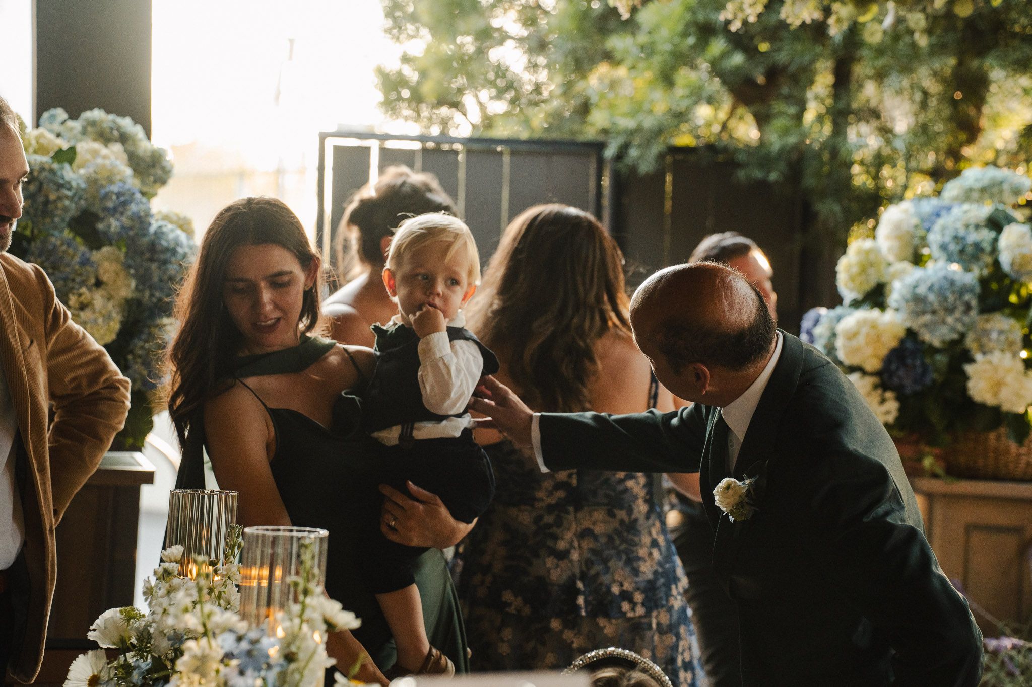 Natural candid moment of guests at a Pasadena outdoor wedding