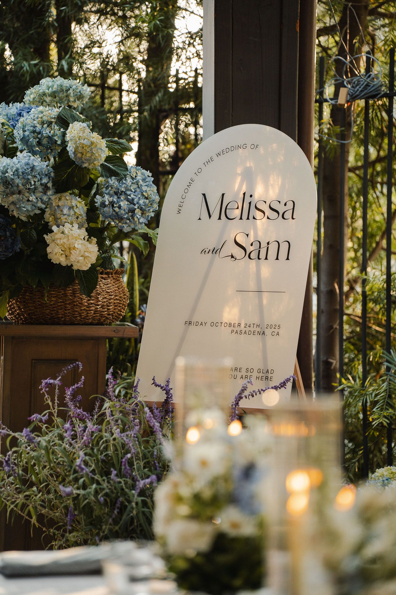Elegant wedding sign surrounded by florals at an intimate Pasadena event