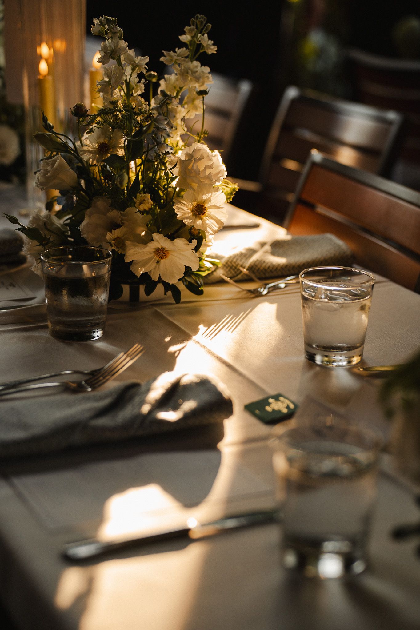 Elegant white florals and candles arranged for an intimate Los Angeles wedding