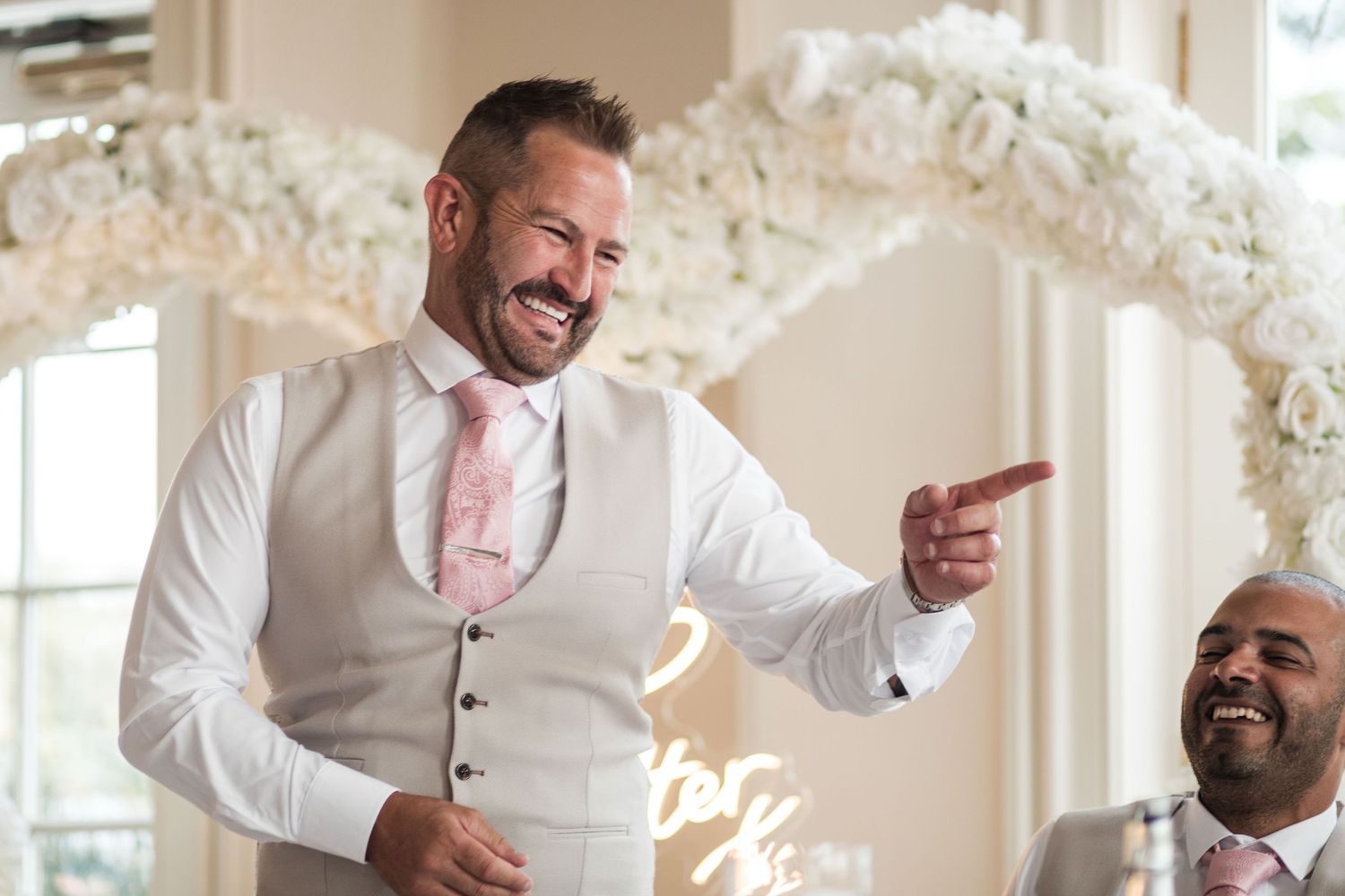 Groom laughing while giving his speech at Hodsock Priory