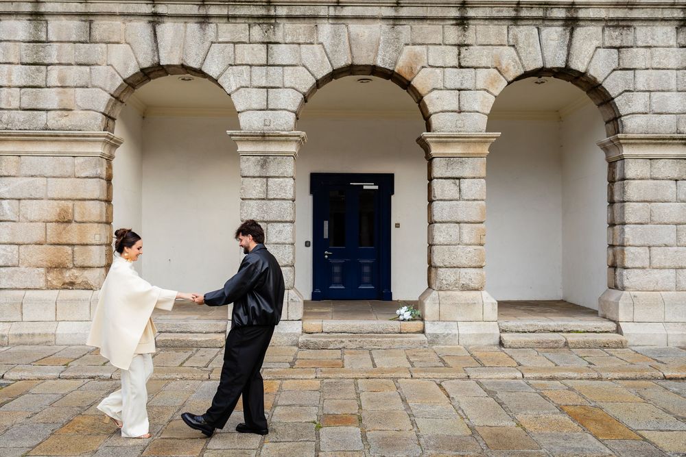 Architectural editorial moment at Dublin Castle — cinematic post-wedding portrait.