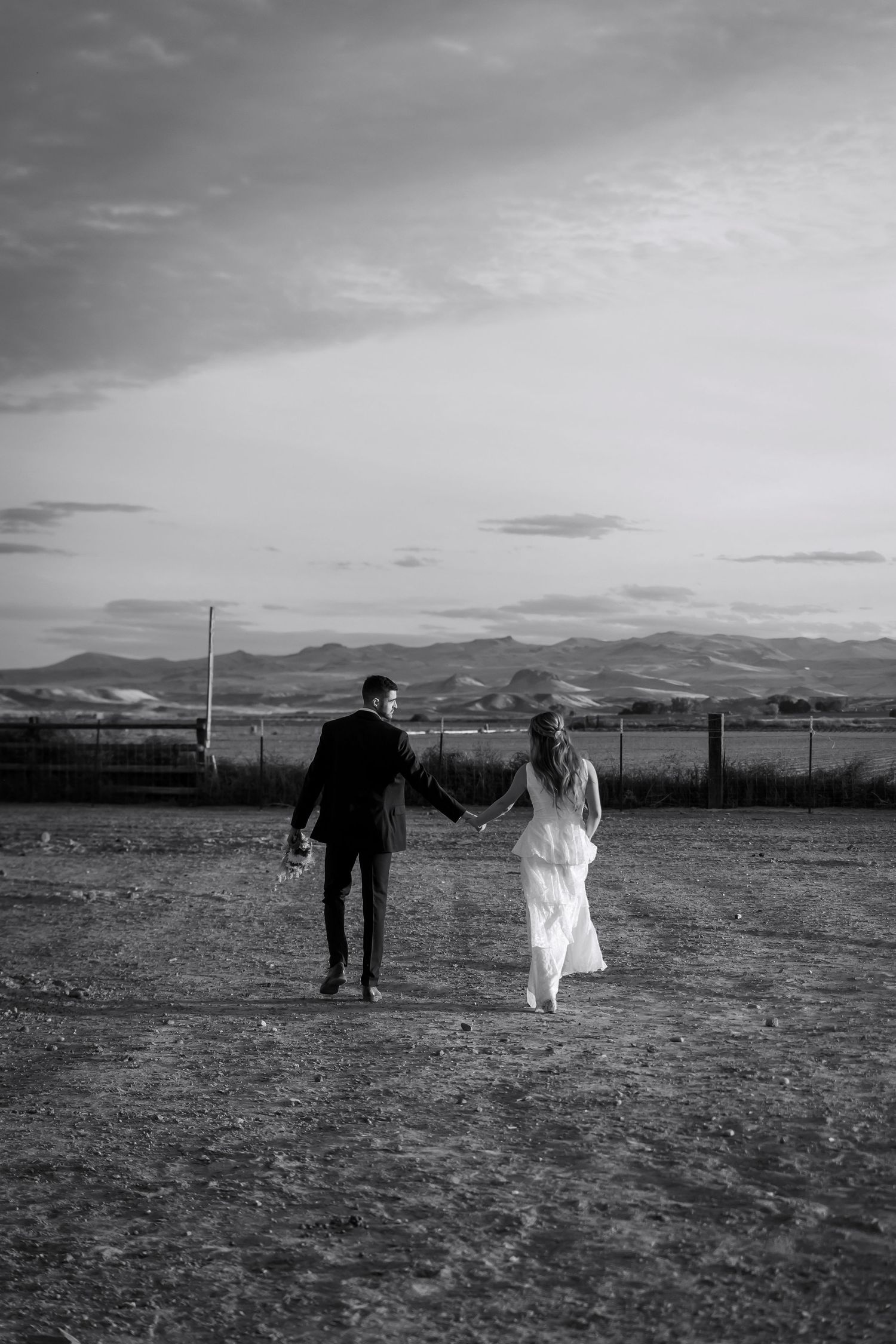 bride and groom couples photos in pasture with mountains