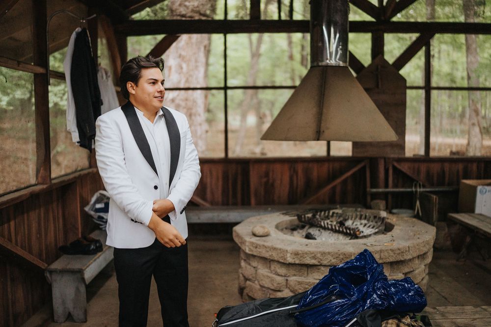 A rustic barn wedding venue with vintage decor and romantic lighting creates an intimate atmosphere.