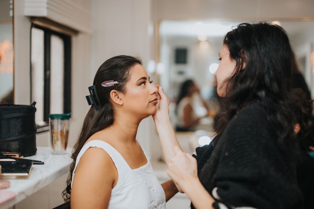 Candid moments of celebration in bright indoor setting with natural light.