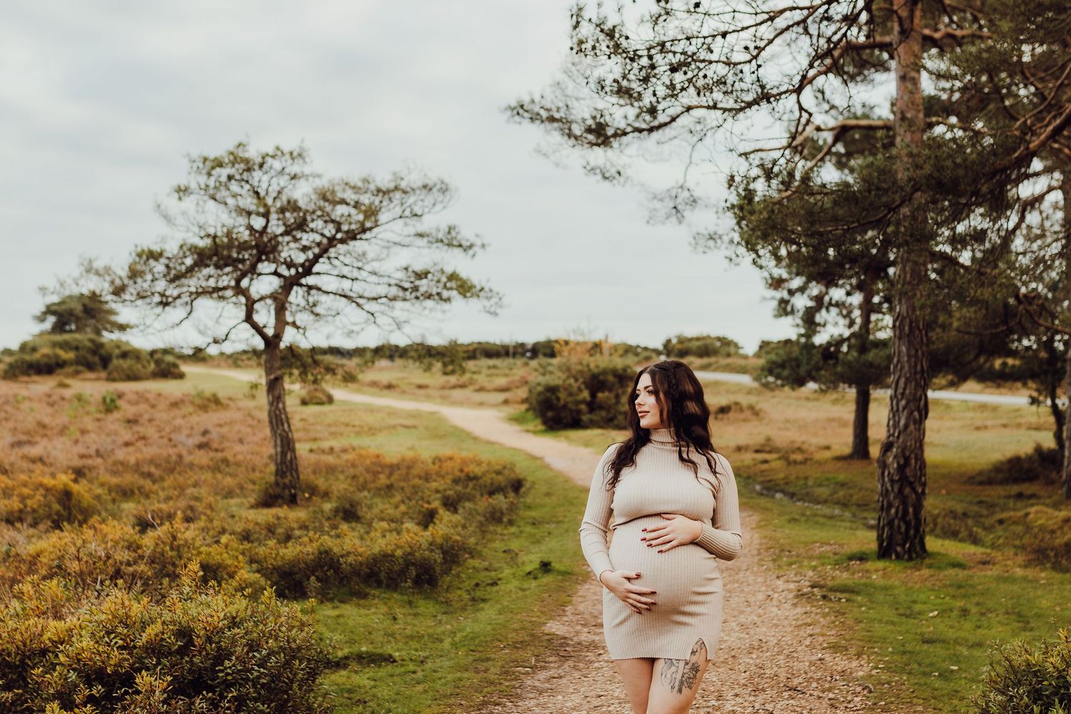 Pregnant woman photographed outdoors in New Forest in autumn