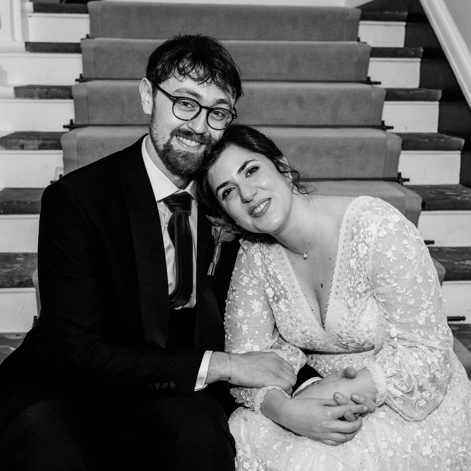 A black and white photo collage shows tender moments between a couple in formal wedding attire.