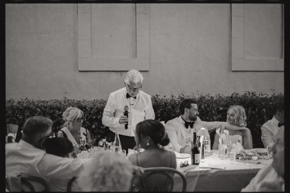 A black and white photo collage showing people dining at formal tables during what appears to be a banquet or reception.