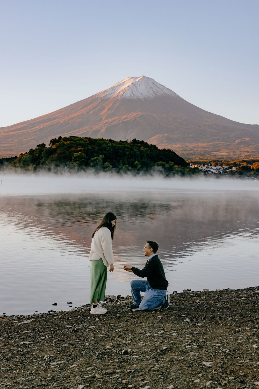 Scenic series of photos at Mount Fuji's lakeside showing misty morning atmosphere and people on rocky shore at sunrise.