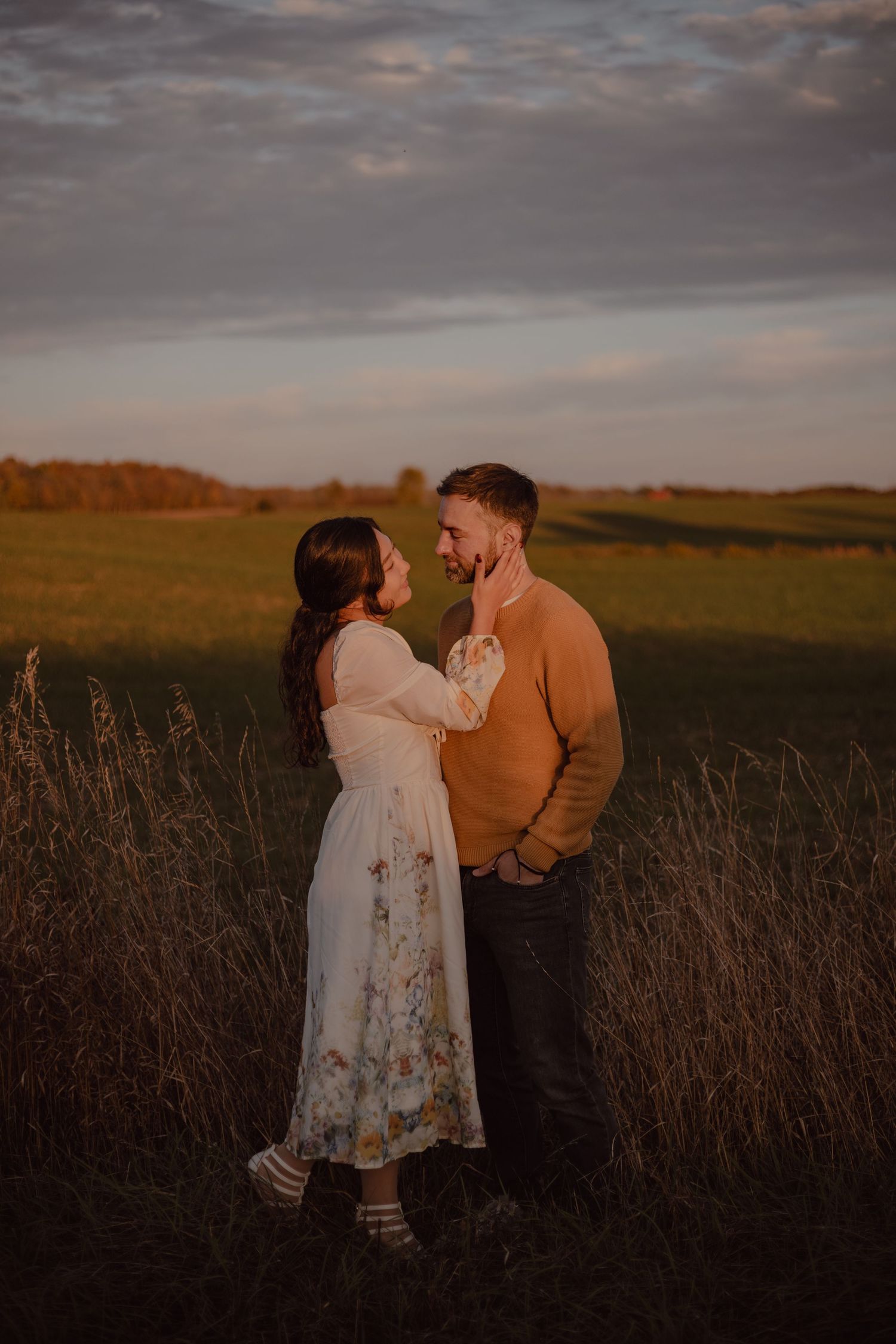 Couple posing during sun set in Caledonia.