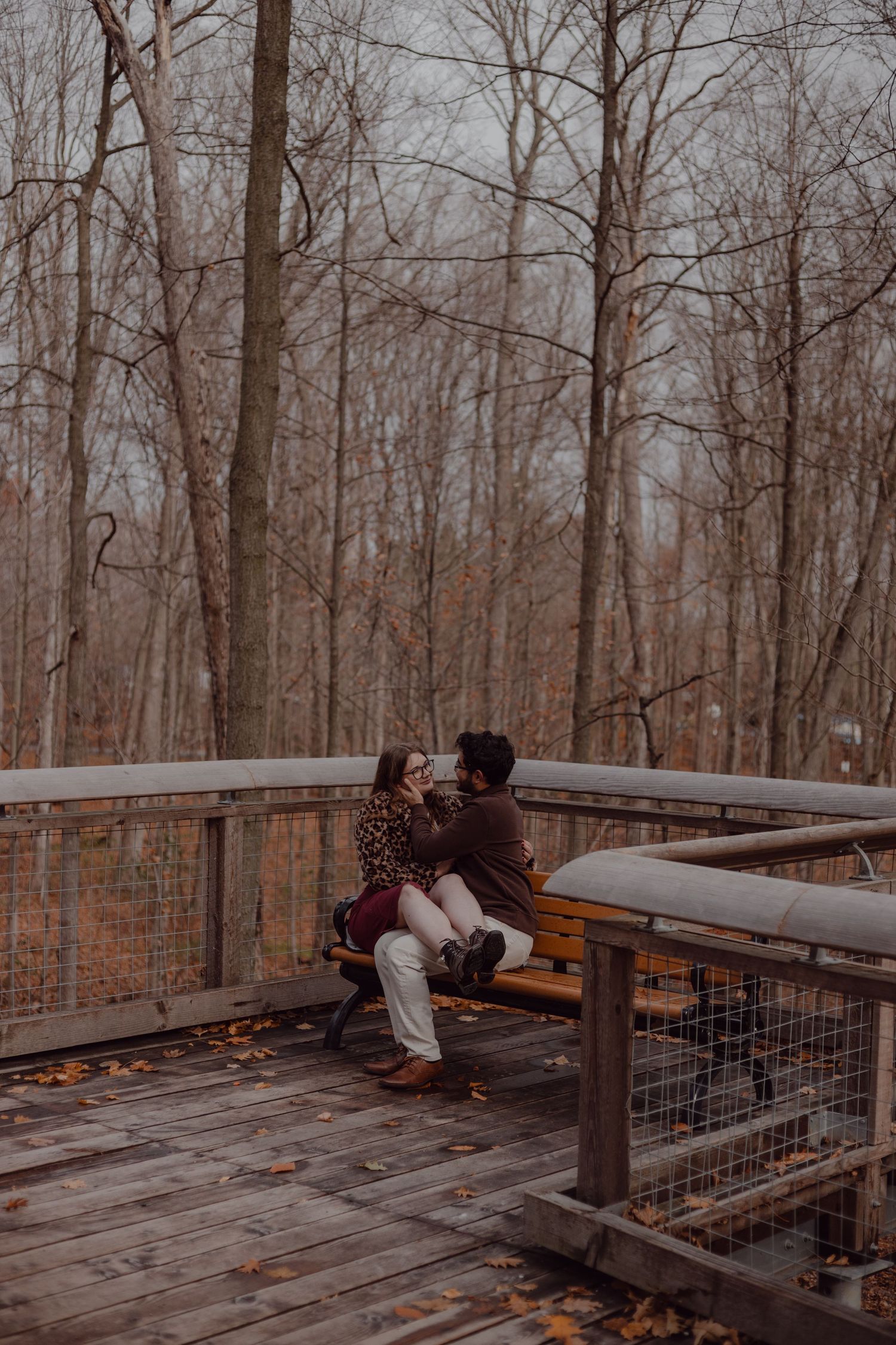 During an engagement session at Toronto Zoo in cold of November.