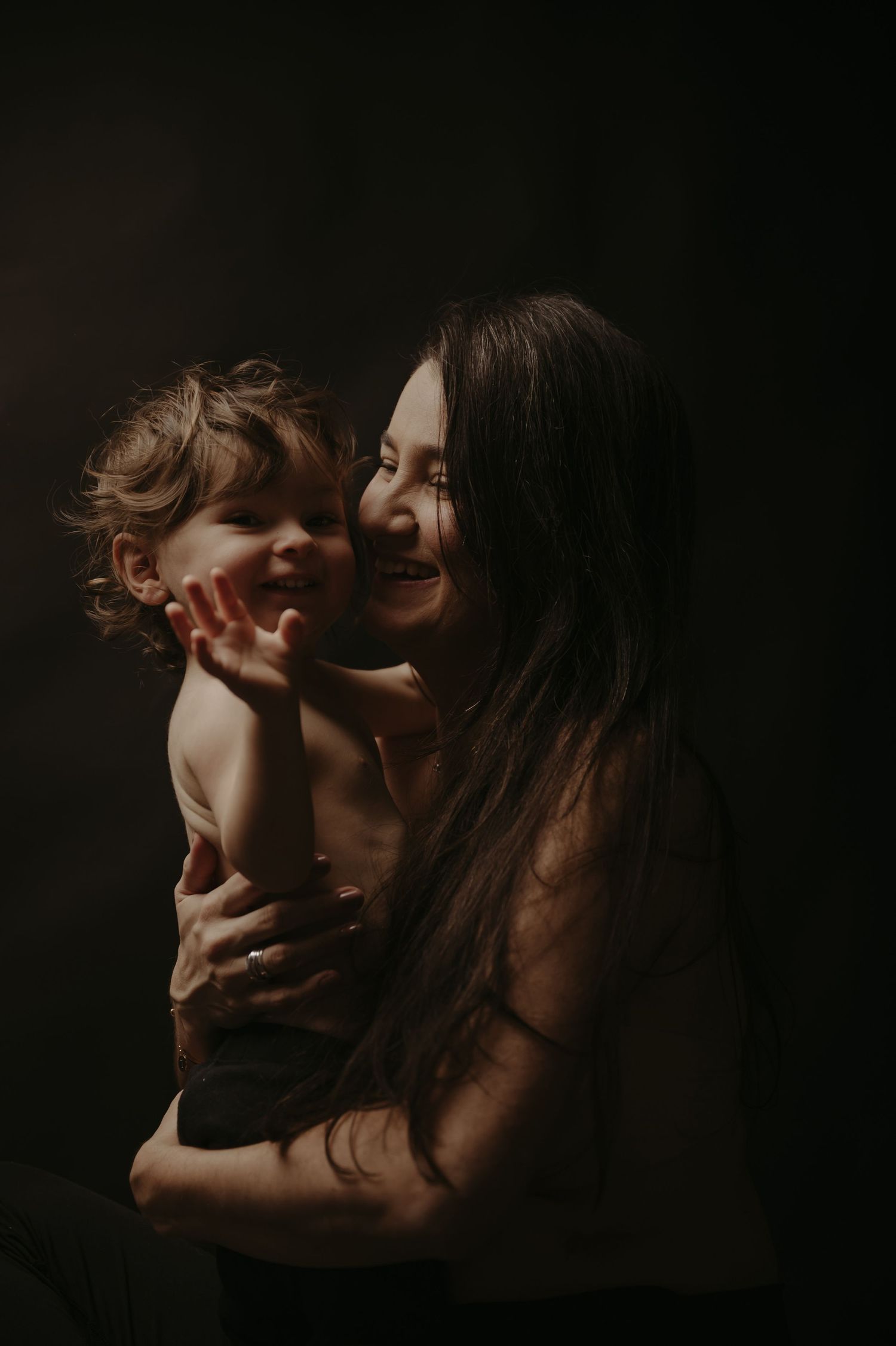 A dark and moody series of intimate photographs captured against a black background in a dramatic artistic style.