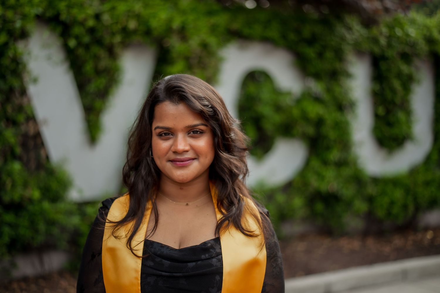 VCU green wall portrait of woman