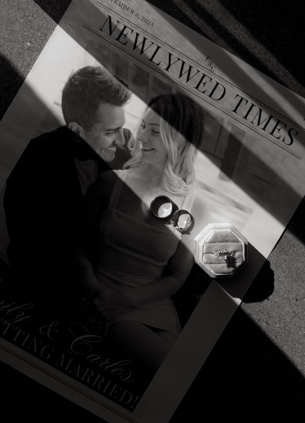 Black and white photos show hands holding newspapers with The New York Times masthead visible in dramatic lighting.