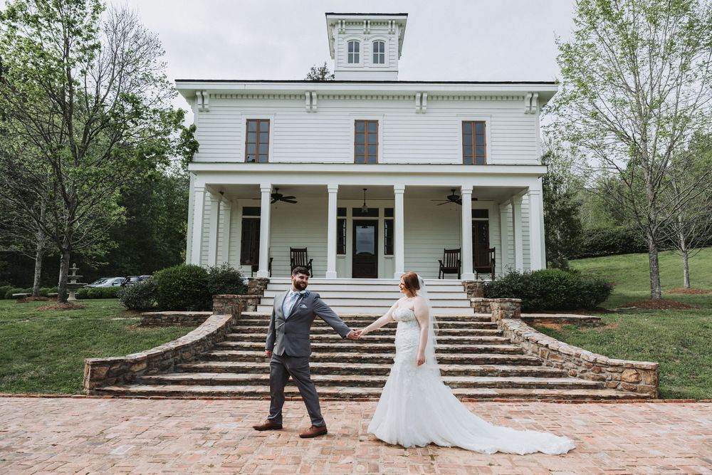 A series of exterior shots showing a white historic mansion venue with columns and stone steps for a springtime wedding ceremony.