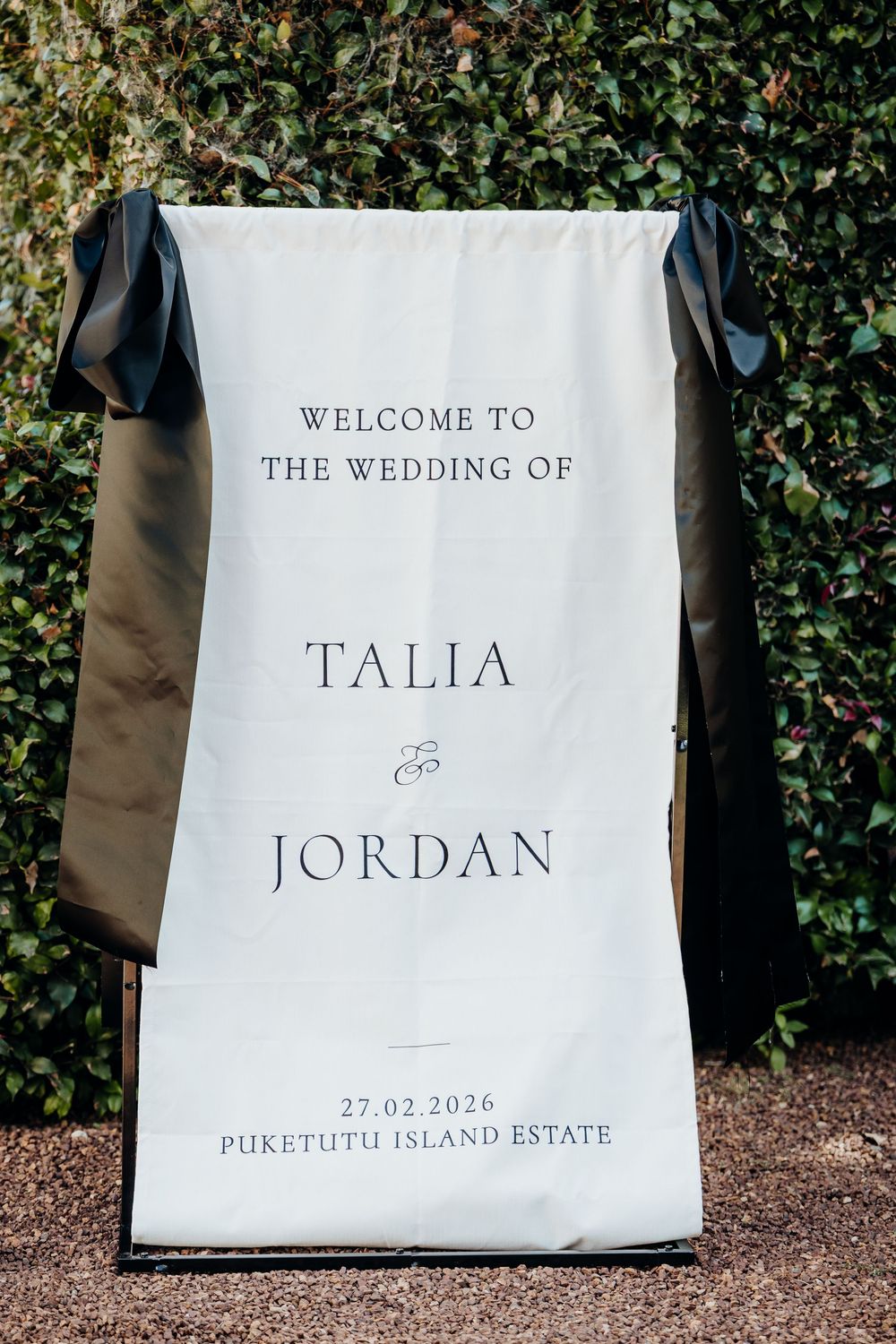Elegant wedding welcome sign for Talia and Jordan on February 27 2026 at Puketutu Island Estate.